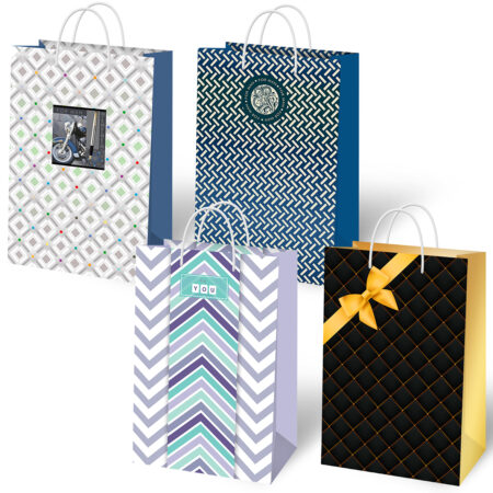 Torebki ozdobne we wzory geometryczne w kolorach granatowym, fioletowym i czarnym.