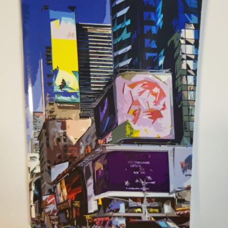 Zeszyt z kolorową panoramą miasta.